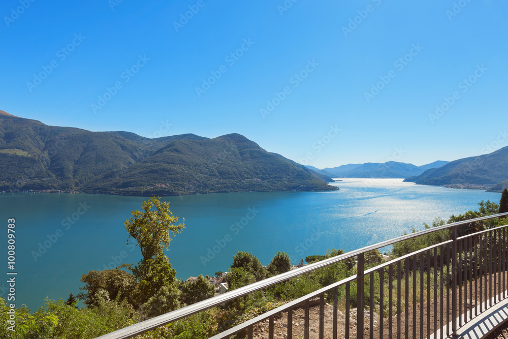 Panoramic of Lake Maggiore, part of Italian Switzerland. A very bland sunny day in pina estat with an intense blue lake