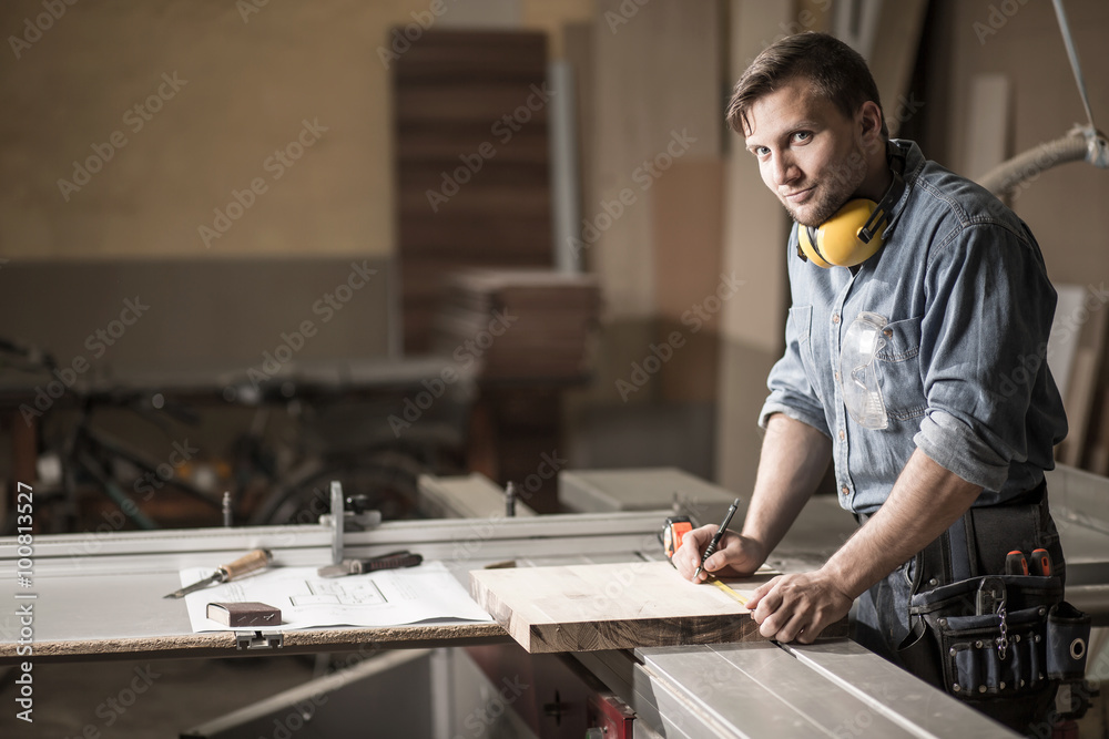 Man in private carpentry workshop Man in private carpentry workshop