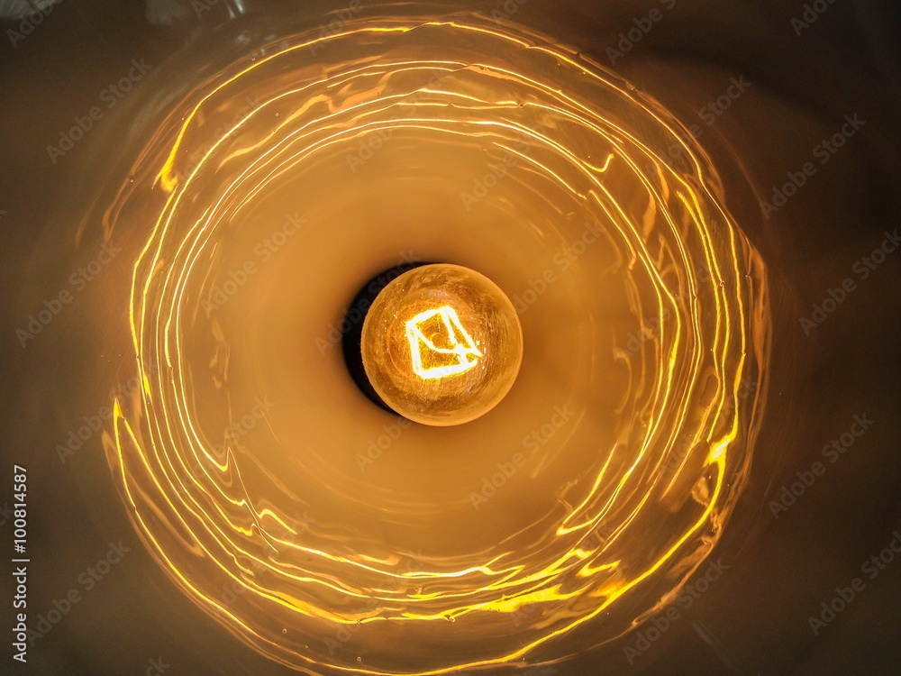 Light bulb illuminated and taken from above