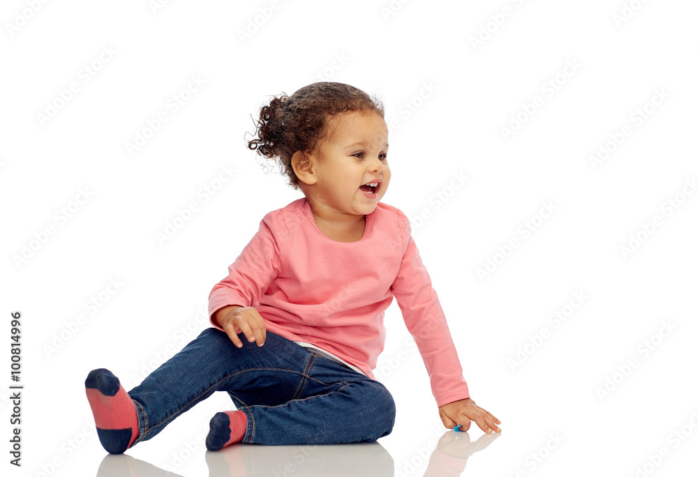 smiling little baby girl sitting on floor smiling little baby girl sitting on floor