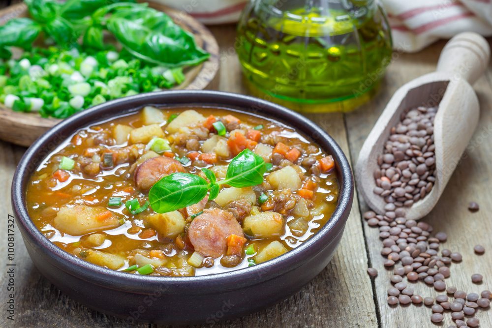 Homemade soup with lentils and sausages Homemade soup with lentils and sausages