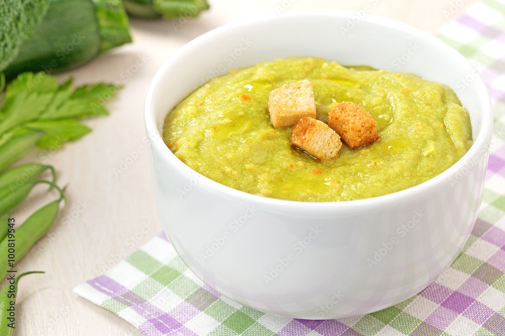 vegetable soup with croutons on checkered napkin vegetable soup with croutons on checkered napkin