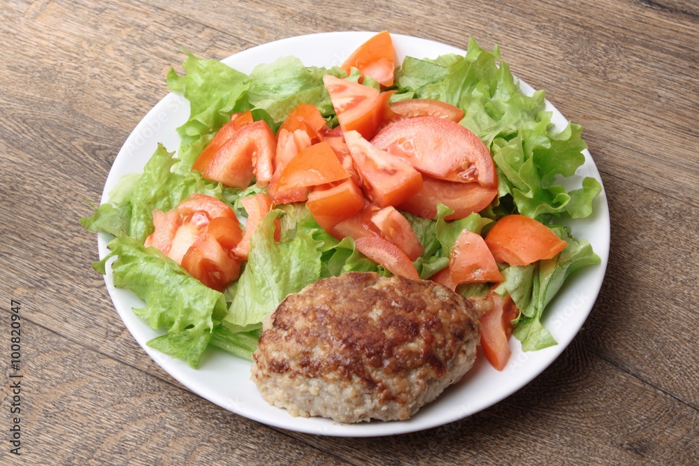 Fried cutlet meatballs with salad