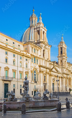 Rome - Piazza Navona and baroque Santa Agnese in Agone church in morning light and Fontana del Moro.