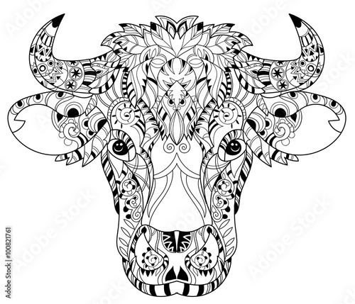 Hand drawn doodle outline cow head decorated with ornaments.Vector zentangle illustration.Floral ornament.