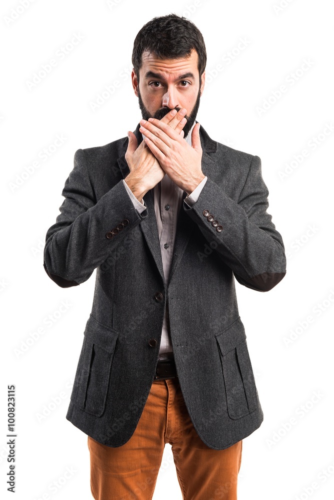 Man covering his mouth Man covering his mouth