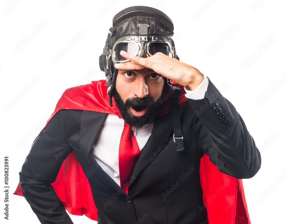 Super hero businessman showing something Super hero businessman showing something