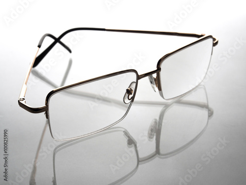 Reading glasses on a white background. 