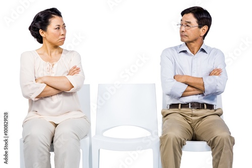 Older asian couple having an argument