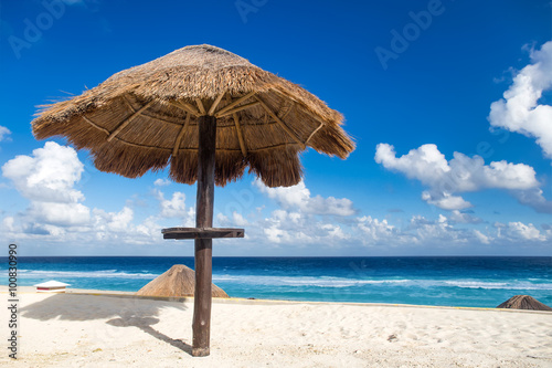 Sun umbrella on beautiful beach