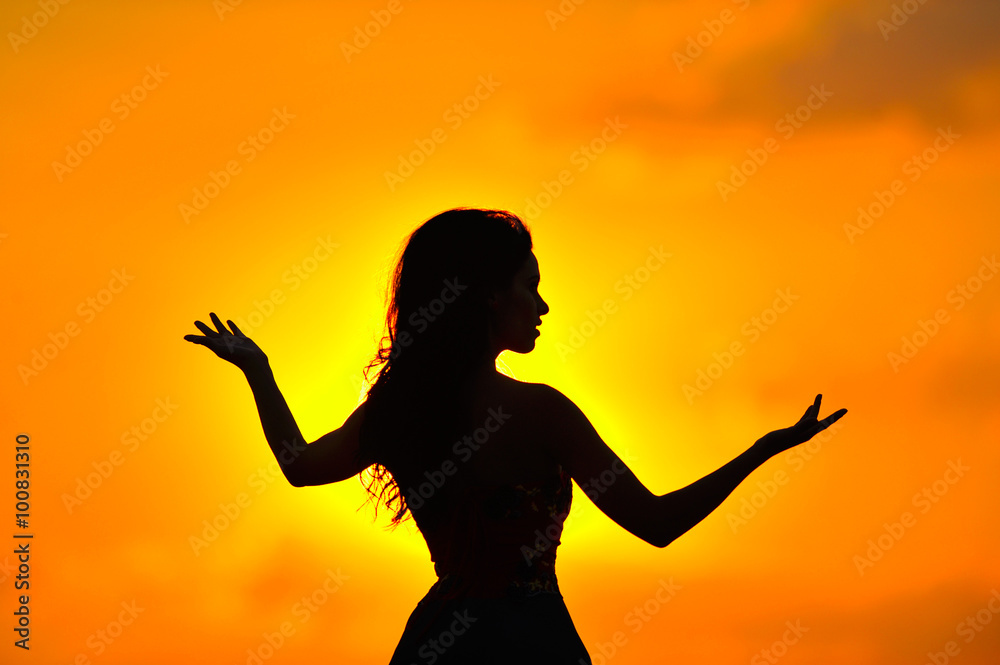 young woman silhouette at sunset young woman silhouette at sunset