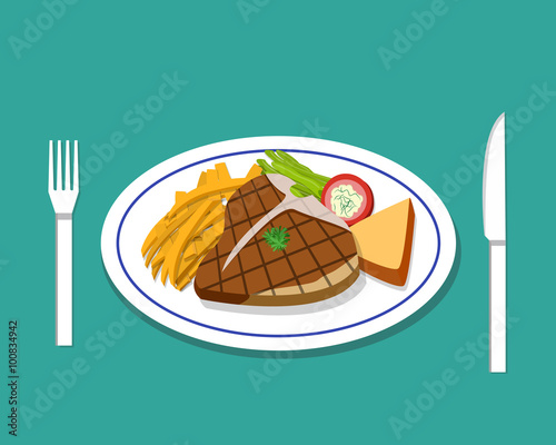 T-bone steak and french fries on dish