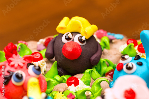 Celebration colorful cake decorated with fruit, chocolate and fi