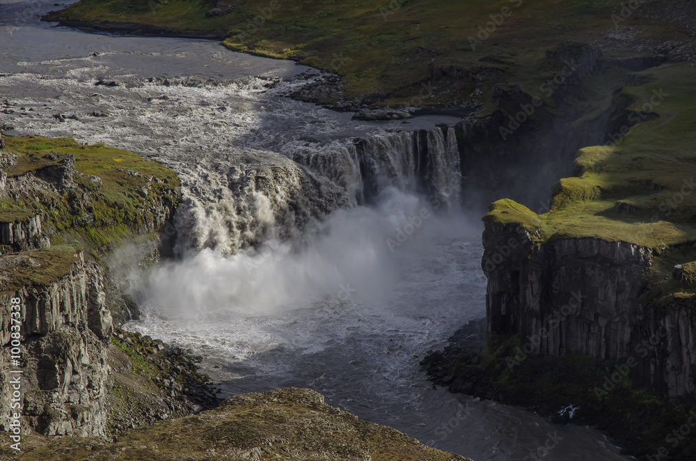 Obraz premium View on canyon of river and waterfall Hafragilsfoss in Iceland,