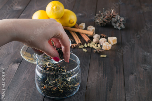 Woman strew herbal tea