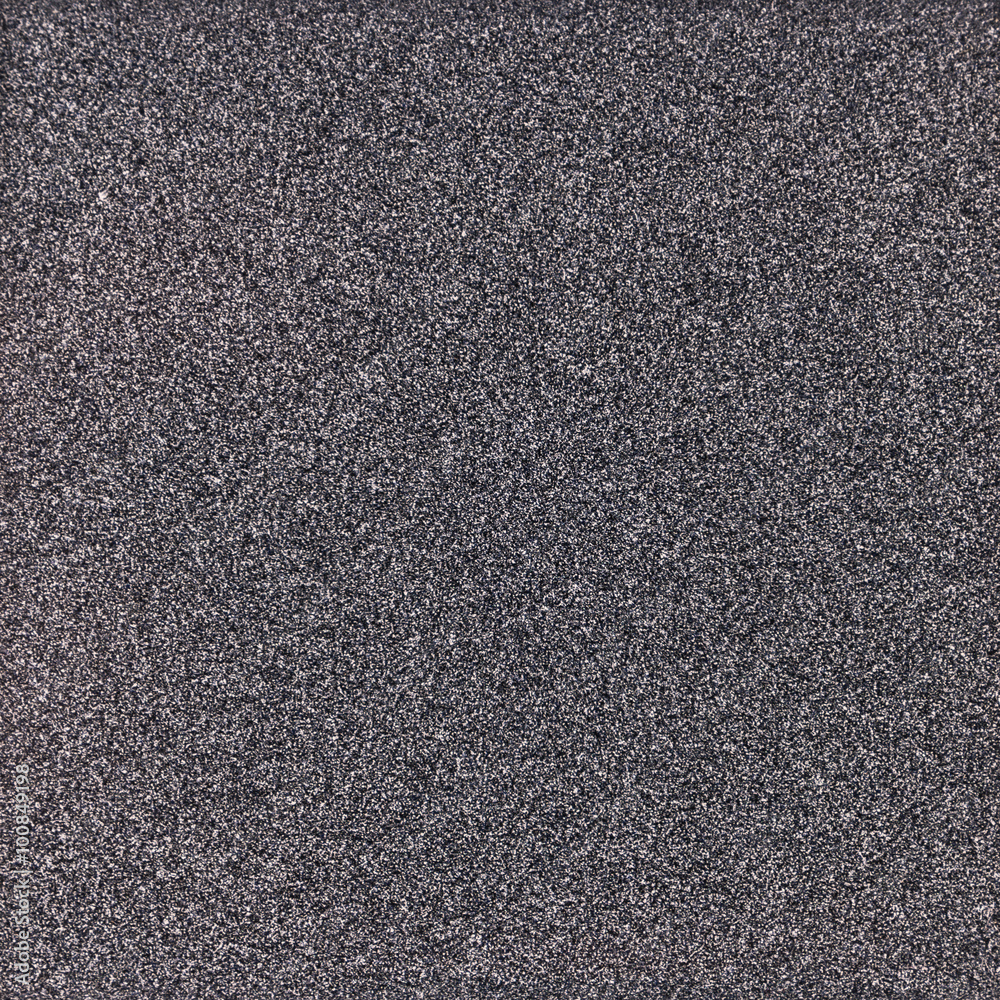 Background texture of a shiny metal sheet with a rough stippled Background texture of a shiny metal sheet with a rough stippled