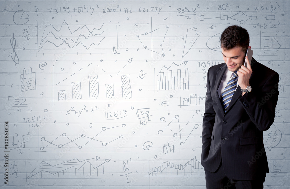 Salesman standing with drawn graph charts Salesman standing with drawn graph charts