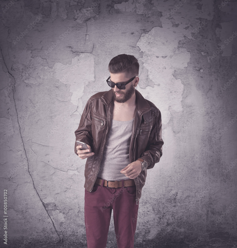 Handsome hipster in fashion clothing