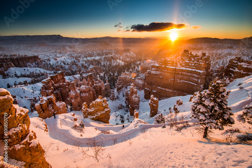 Snowy Hoodoos Glowing During Sunrise in Bryce Canyon National Park