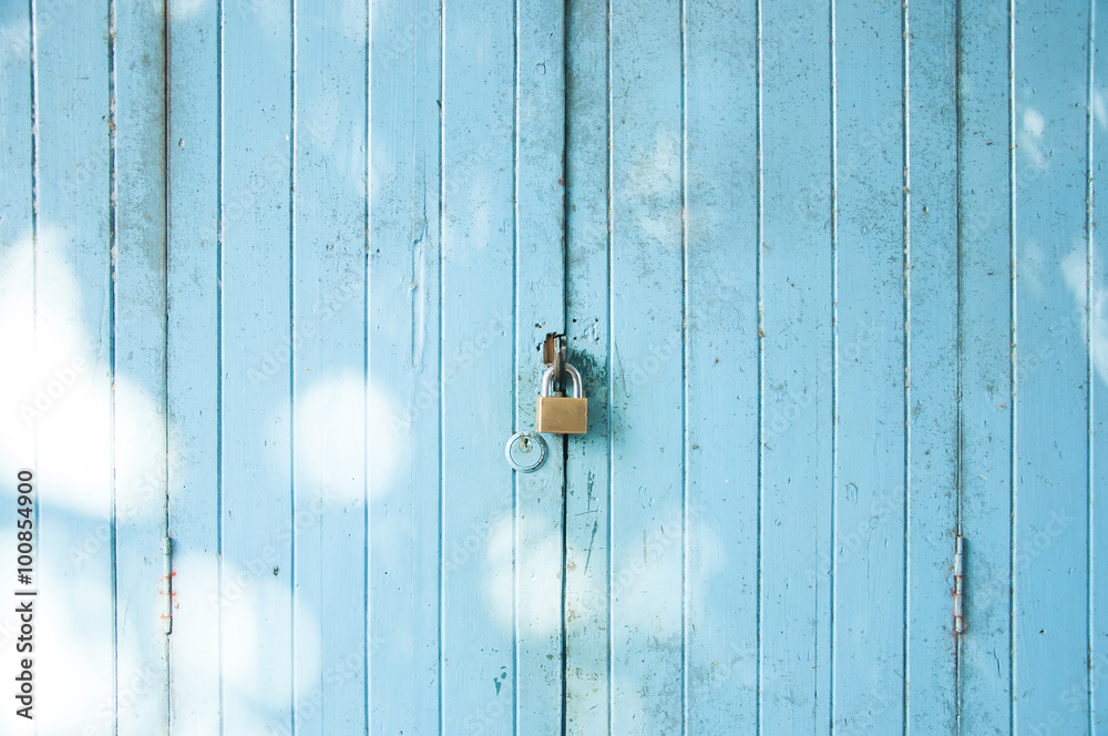 Blue grunge door was locked by locker