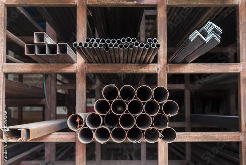 Photo Metal pipe stack on shelf