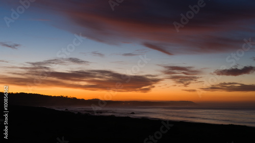 Pacific Coast Sunrise Dramatic Saturated Orange Hues Over Ocean