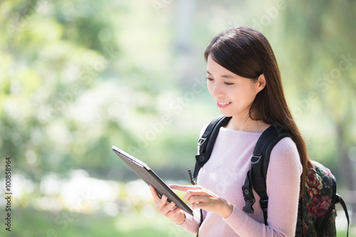 woman student with digital tablet