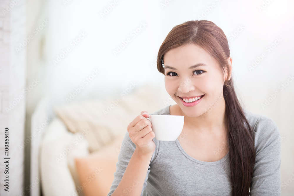 woman holding cup woman holding cup