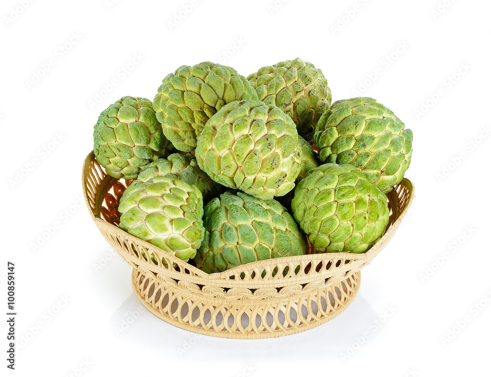 Fototapeta premium Sugar apple in the basket isolated on the white background