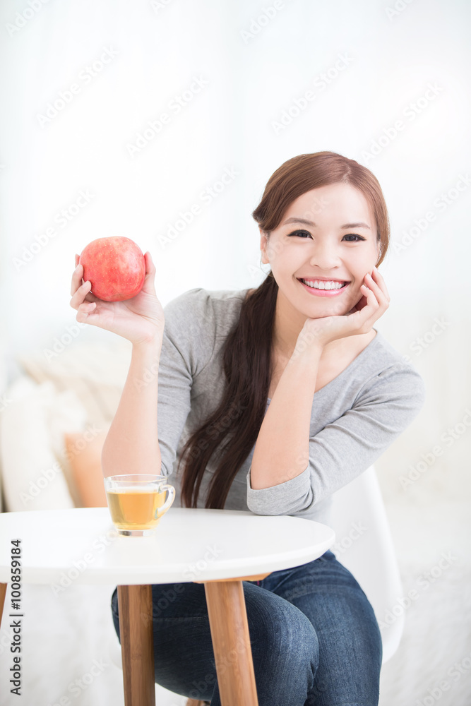 woman hold red apple