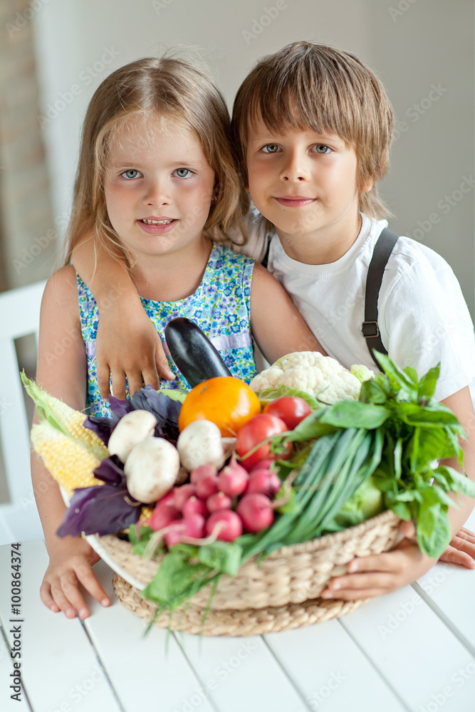 Kids with basket vegetables Kids with basket vegetables