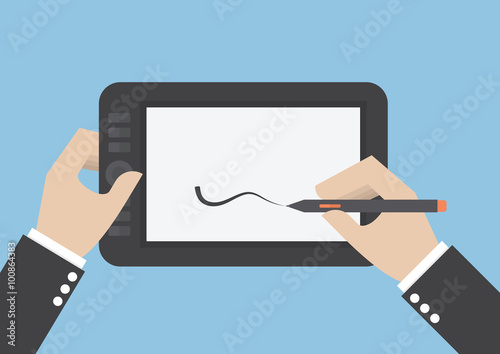 Businessman hands drawing on graphic tablet