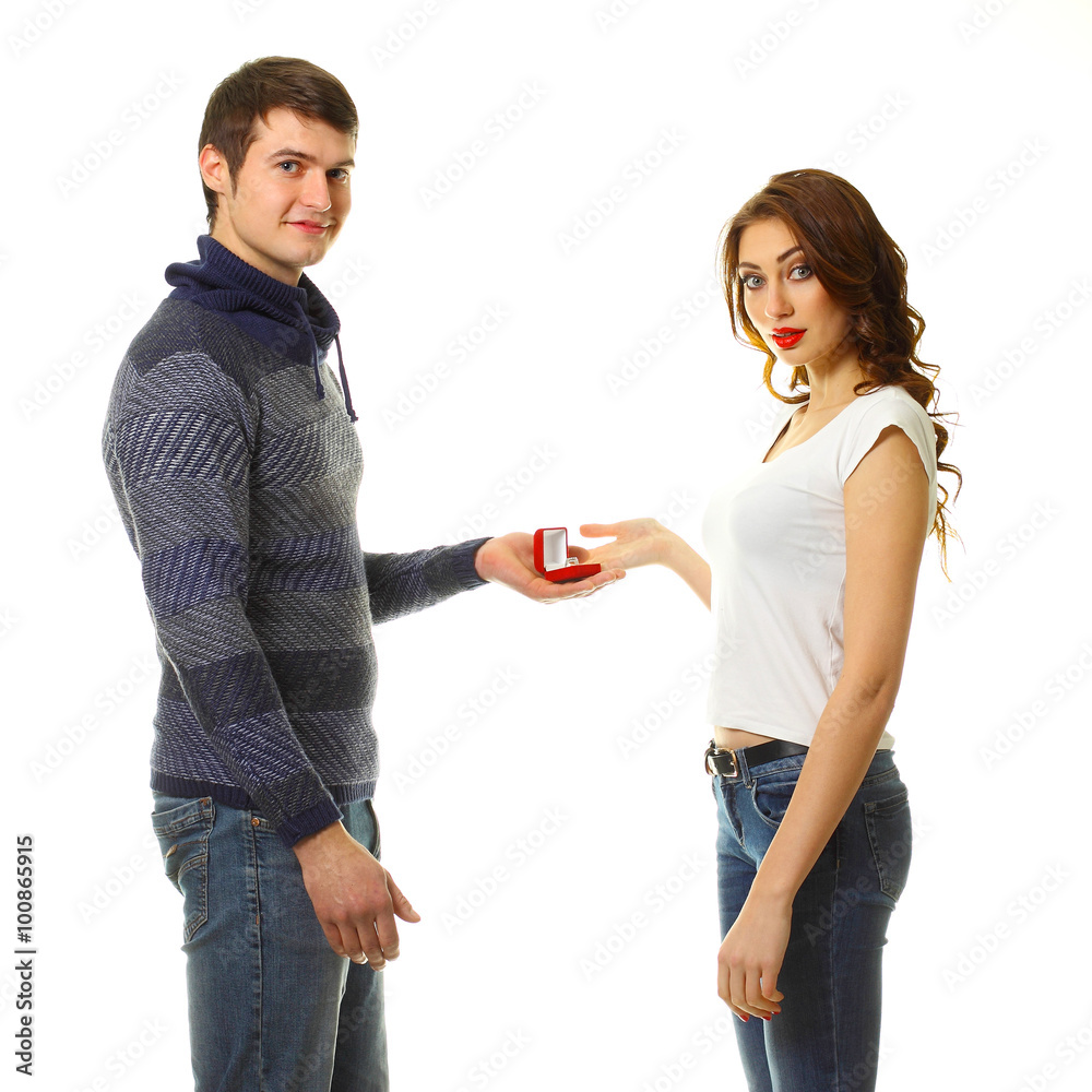 The young man makes a proposal to marry the girl. A man makes a gift to the woman he loves. The young man makes a proposal to marry the girl. A man makes a gift to the woman he loves.