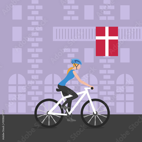 Vector illustration of cyclist girl on bike that rides through the city; biker and bicycling; sport and exercise. Flag of Denmark on the balcony. Healthy lifestyle in Denmark