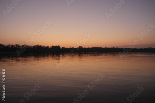 Sunset over the river. © SkysenseStockFootage