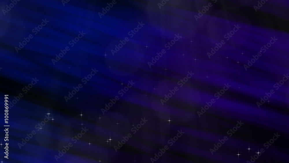 This perfectly seamless abstract loop features a colorful background of cobalt blue and violet purple with rising sparkling particles and subtle shafts of light.