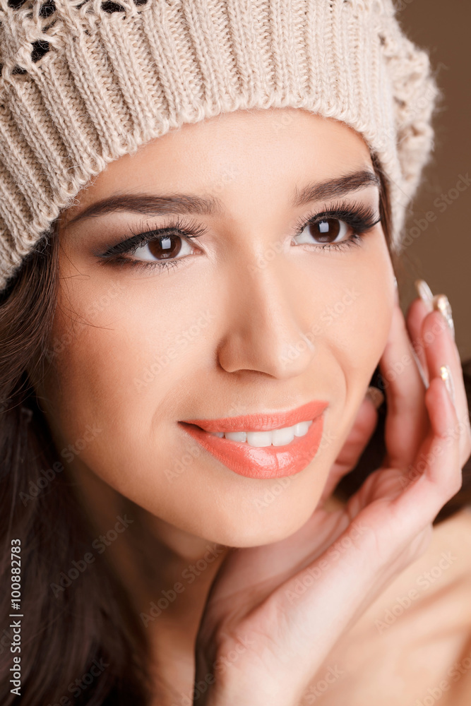 Happy woman in knitted sweater and hat. Fashion photo Happy woman in knitted sweater and hat. Fashion photo