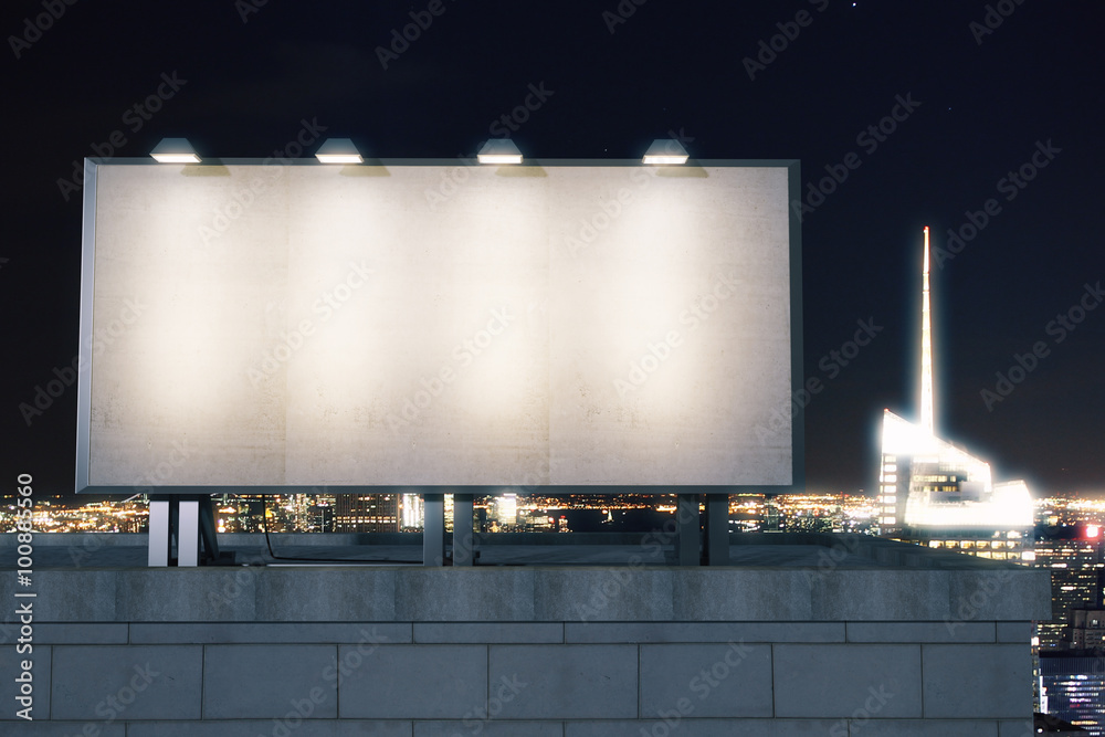 Big empty billboard on the background of the city at night, mock - obrazy, fototapety, plakaty 