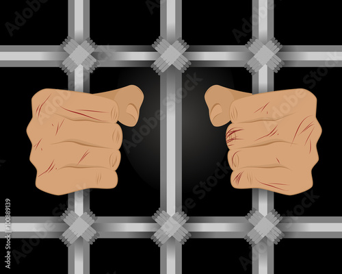 Prisoner behind bars