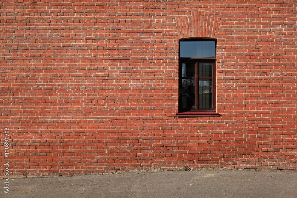 Brick wall with a window