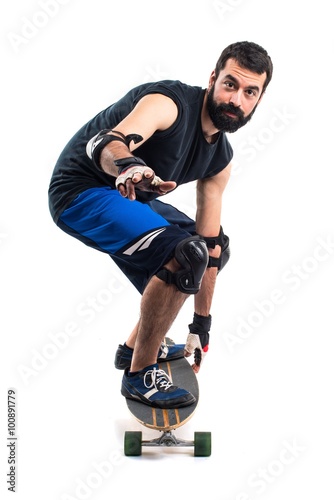 Man riding a skateboard © luismolinero