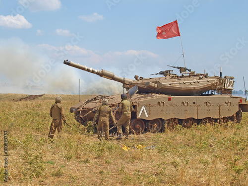 Merkava tanks and Israeli soldiers in training armored forces