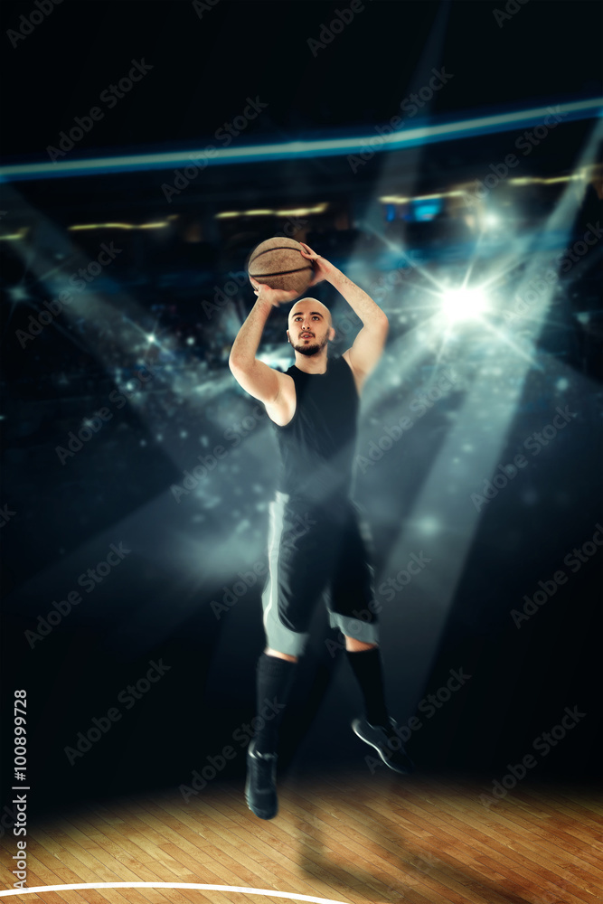 Fototapeta premium Sportsman playing basketball and shootnig three point shot