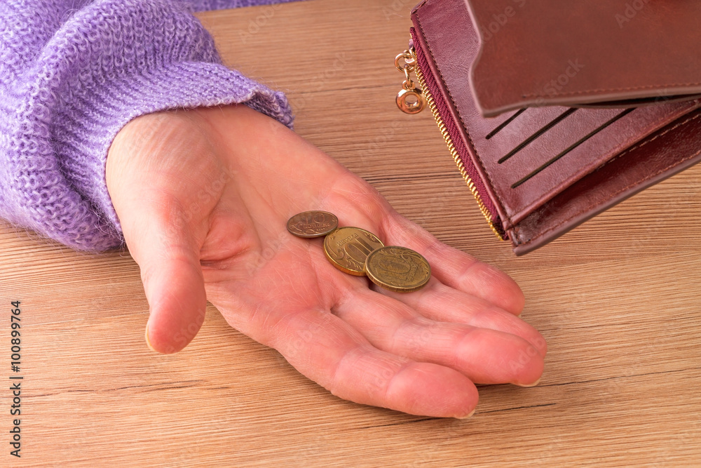 Fototapeta premium Woman with three coins