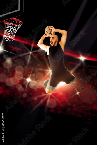 professional basketball player makes a slam dunk in the game © ponomarencko