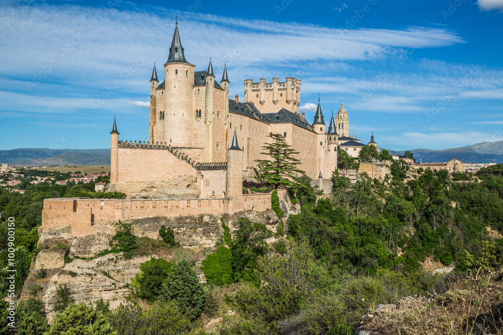 Segovia, Spain. The famous Alcazar of Segovia, rising out on a r
