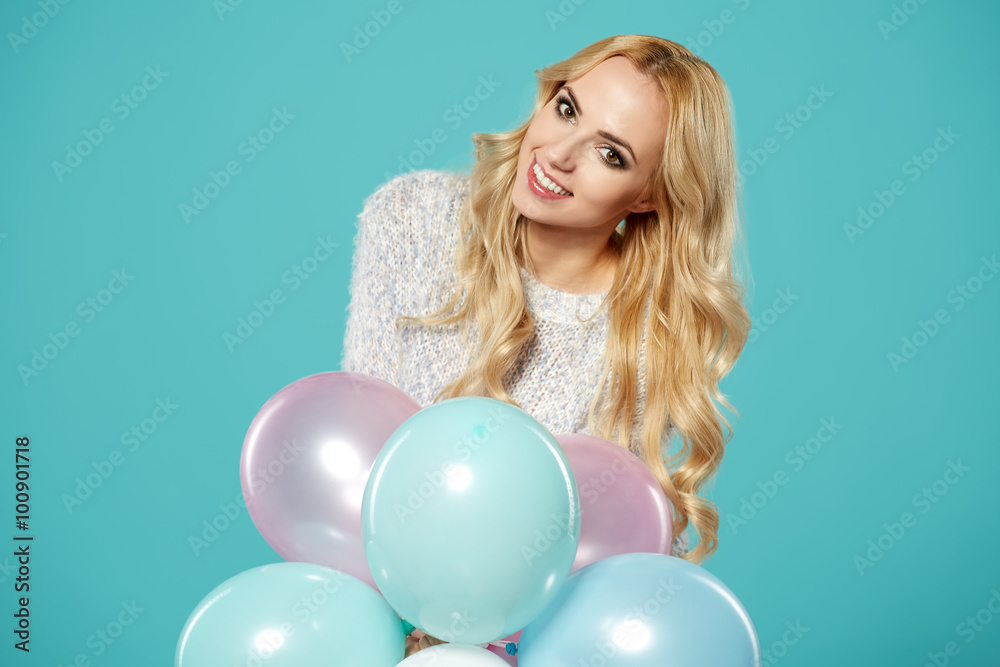 Attractive beautiful woman with balloons in studio Attractive beautiful woman with balloons in studio