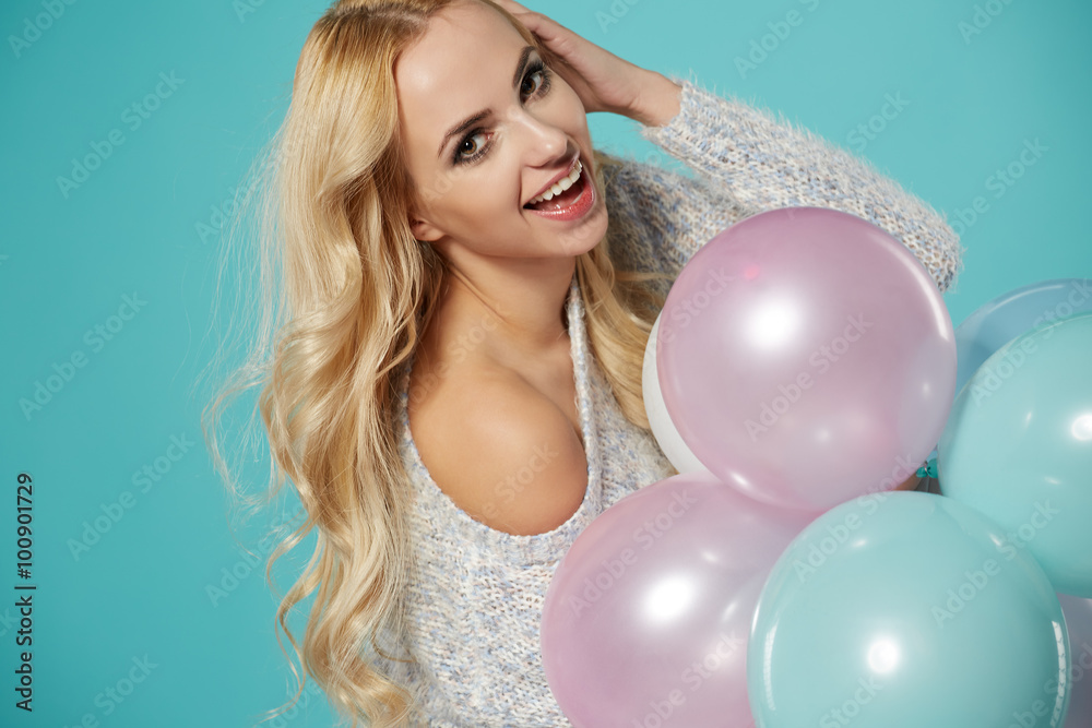 Attractive beautiful woman with balloons in studio Attractive beautiful woman with balloons in studio