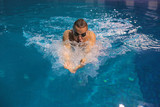 Male swimmer at the swimming pool