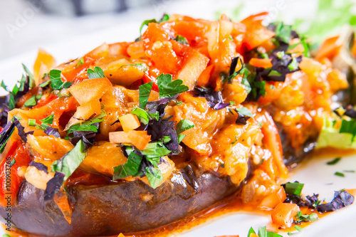 Stuffed eggplant with fried vegetables